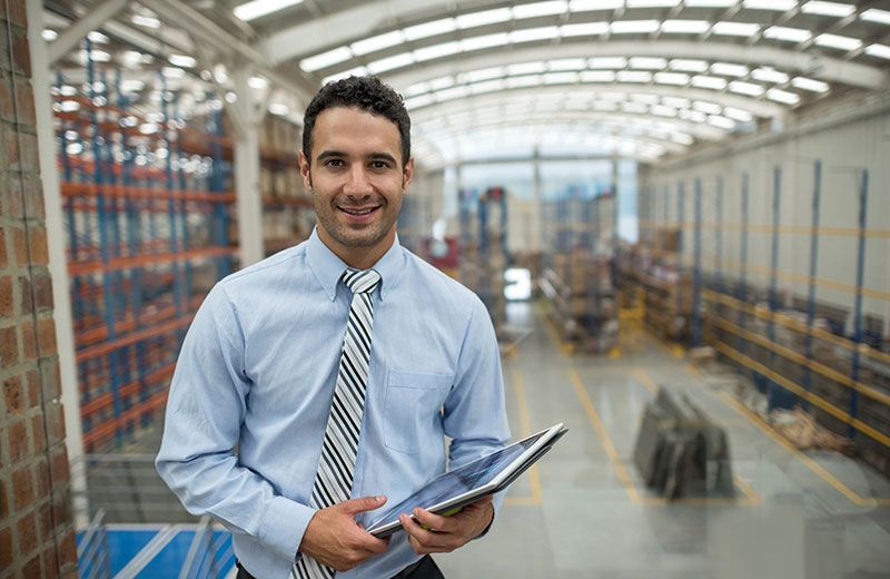 Man inside building of supplies for construction